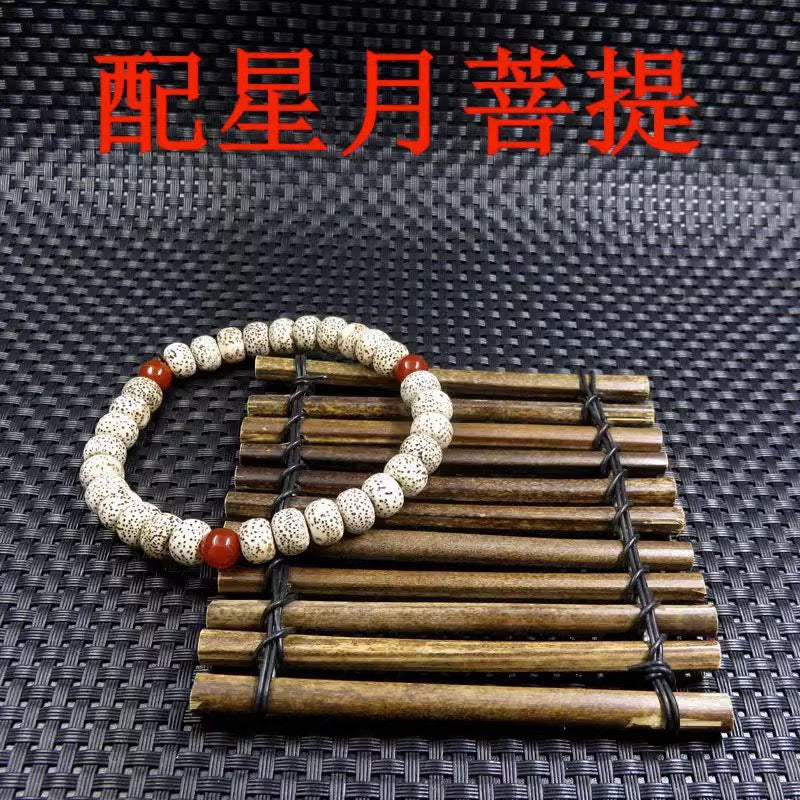 Pair with Star and Moon Bodhi Seeds